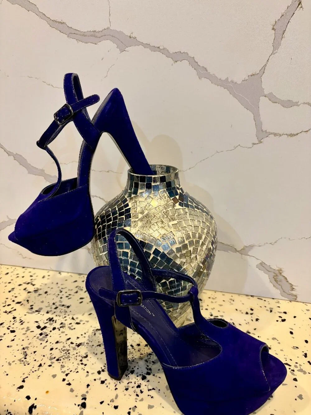 Suede Blue 7 1/2, excellent condition strap on shoe.